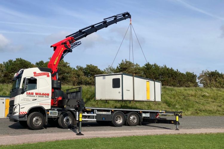 Ian Wilson Haulage, siting a portable office unit on customer premises, Whitehaven, Cumbria